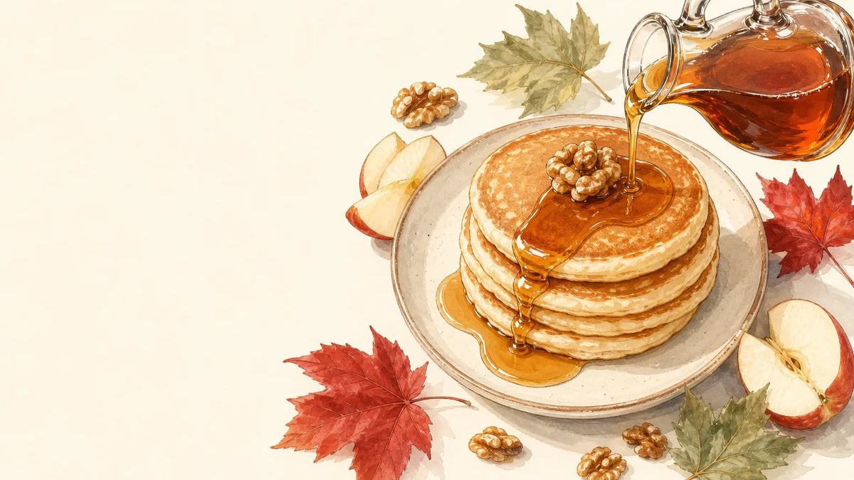 Pancakes dorées nappées de sirop d’érable avec pommes et noix